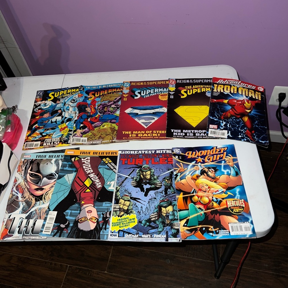 Comic Book Collection with Superman and Iron Man Covers
Among others